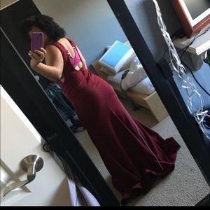 A burgundy prom dress